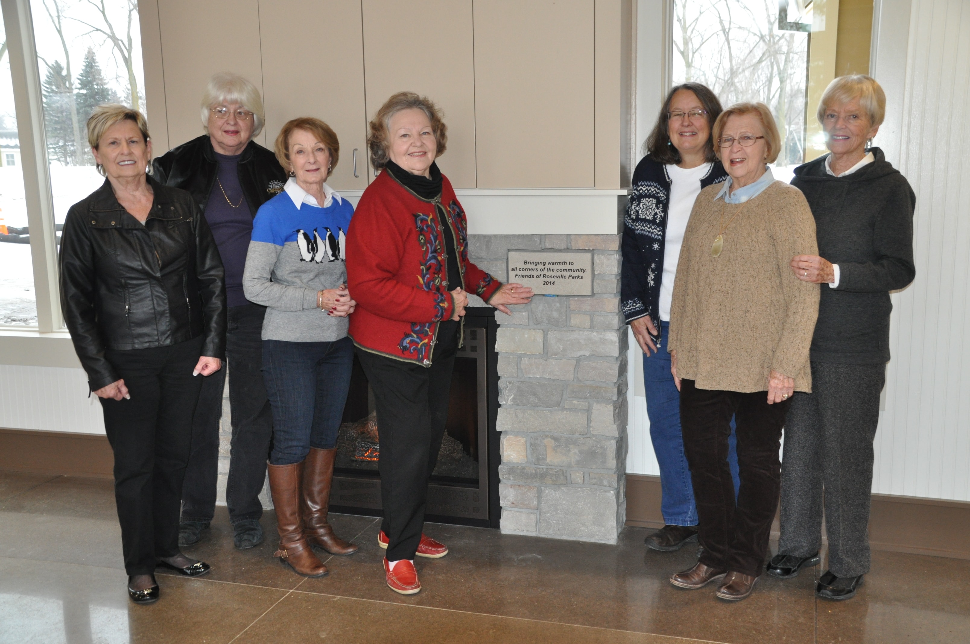 FOR Parks members gathered at the fireplace donated to Roseville Parks in 2014
